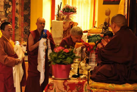 Ven. Lama Namgyal, Ven. roara Vestre, and Ven. Lama Gyurme offering the body, speech, and mind mandala to H.E. Jetsun Khandro Rinpoche, Vajradharling, France 2012.