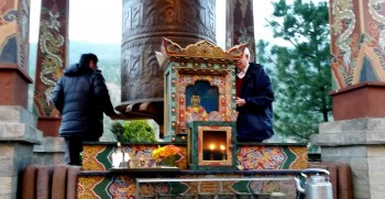 bp-1-thimphu-taj-hotel-prayer-wheel Prayer wheel and shrine in the courtyard of the Taj Hotel in Thimphu.