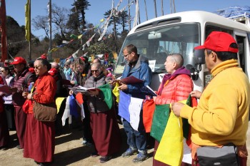 bp-2-pelela-pass-holding-prayer-flags Preparing to hang prayer flags at Pelela Pass.