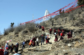 bp-3-climbing-to-chodrak-monastery Jetsün Khandro Rinpoche leads the climb to Chödrak Monastery built at the site of Longchenpa's retreat cave.
